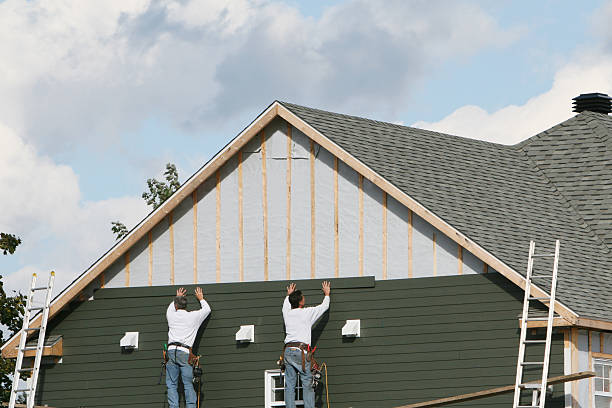 Professional Siding technician working in Titusville, PA